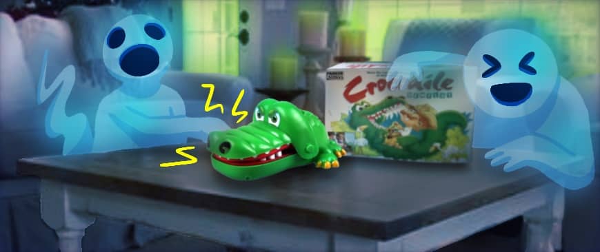 A ghost laughing at his ghost friend getting chomped by the Crocodile Dentist board game